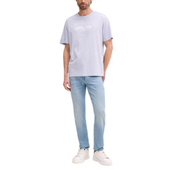Image 2 : Vue de face du jean droit Calvin Klein Jeans homme, détail taille avec badge logotypé et bouton argenté, coloris bleu clair délavé — Delvale