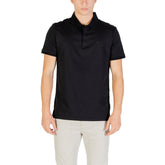 Image 1 : Polo Calvin Klein Jeans homme noir manches courtes, vue de face — Delvale