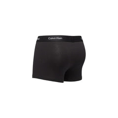 Image 3 : Trois boxers Calvin Klein Underwear homme noirs superposés, détail ceinture élastique large avec inscription Calvin Klein en blanc — Delvale