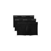 Image 1 : Lot de 3 boxers Calvin Klein Underwear homme en coton stretch noir empilés, vue de face sur fond blanc — Delvale