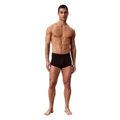 Image 2 : Détail de la bande élastique logotypée Calvin Klein sur boxer homme noir — Delvale