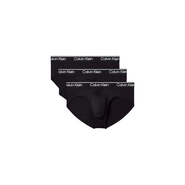 Image 1 : Lot de 3 slips Calvin Klein Underwear homme noirs superposés en éventail, ceinture élastique logo signature blanche visible — Delvale