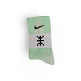 Image 1 : Chaussette Nike Everyday tie-dye vert menthe homme, vue de face pliée avec bande logo boutique — Delvale