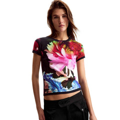 Image 1 : T-shirt Desigual femme bleu aux motifs floraux colorés, manches courtes et col rond — delvale