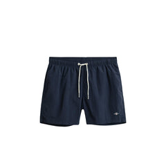 Image 3 : Short de bain Gant homme bleu marine, vue de côté avec poche latérale visible — Delvale