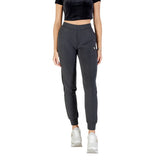 Image 1 : Jogging Guess Active femme gris anthracite coupe ajustée taille haute avec pli frontal et logo triangle doré — delvale