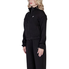 Image 2 : Détail du logo triangle en strass argentés sur sweat crop Guess Active femme noir — delvale
