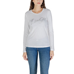 Image 1 : Liu Jo t-shirt femme blanc à manches longues avec logo strass argenté, porté avec un jean brut — Delvale