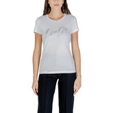 Image 1 : T-shirt Liu Jo femme blanc avec logo script en strass argentés, vue de face portée — Delvale