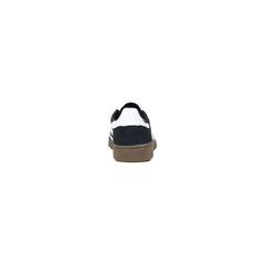 Image 4 : Vue de dessous de la semelle en gomme caramel de la basket Adidas Spezial femme avec logo Adidas moulé — Delvale