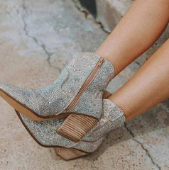 Sparkly cowboy boots with decorative rhinestones and a stylish zip closure for trendy fashion
