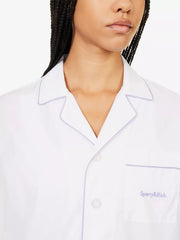 SPORTY & RICH Serif Embroidered Logo Contrast Piping Cotton Poplin Pyjama Top - House Of Huntington