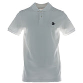 Image 1 : Polo homme Timberland blanc à manches courtes avec logo arbre brodé marine sur la poitrine gauche, vue de face — Delvale