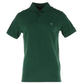 Image 1 : Polo homme Timberland manches courtes en piqué de coton vert sapin avec logo arbre brodé ton sur ton sur la poitrine, vue de face — Delvale