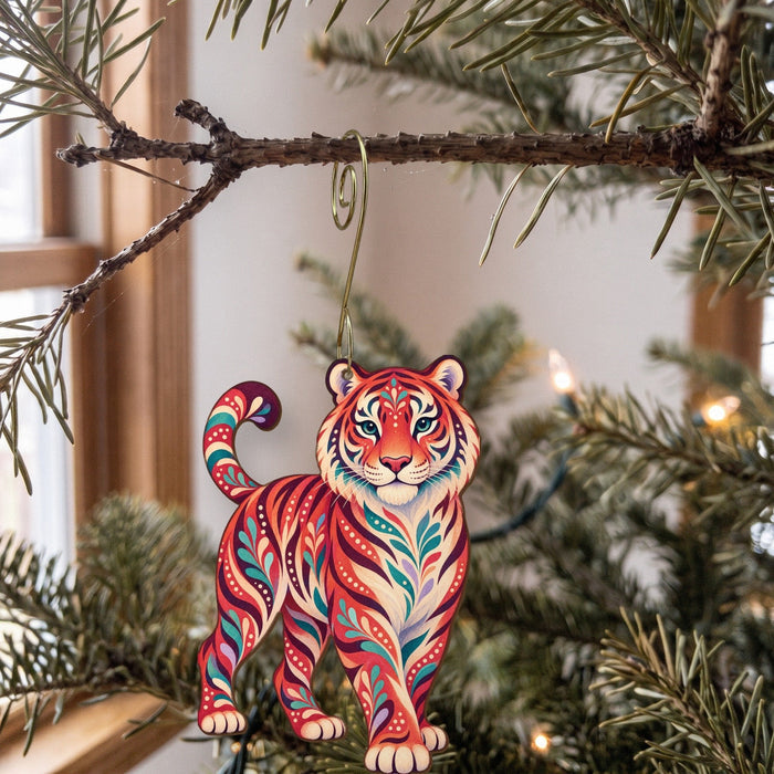 Laser-cut maple wood Bengal Tiger folk art ornament O344 hanging on a fir branch, made in USA