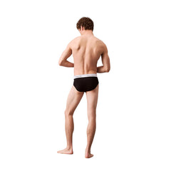 Image 3 : Boxer Calvin Klein homme gris, vue de profil montrant la coupe ajustée — Delvale