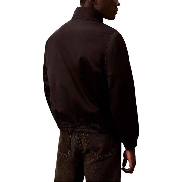 Image 3 : Jaquette Calvin Klein Jeans homme noire, vue de profil montrant la coupe ajustée — Delvale