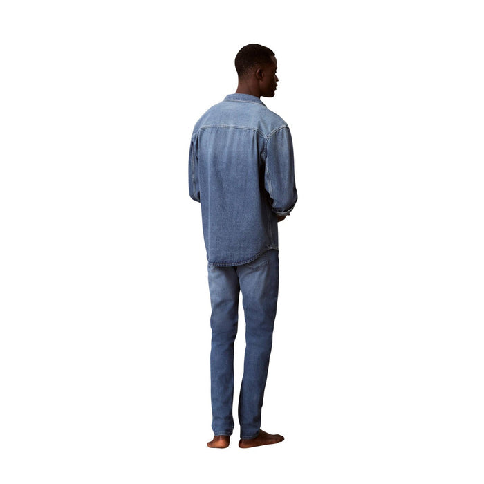Image 2 : Jean slim homme Calvin Klein Jeans délavé, détail de la coupe jambe droite et des finitions denim — Delvale