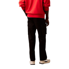 Image 2 : Pantalon Calvin Klein Jeans homme noir, détail fermeture zip et poches frontales — Delvale