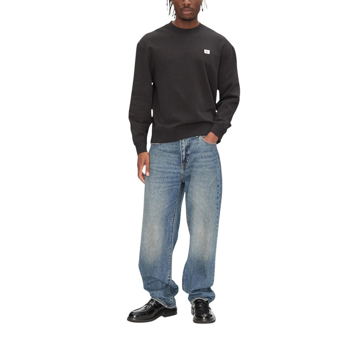 Image 1 : Sweat col rond Calvin Klein Jeans noir homme avec étiquette tissée crème et rouge — Delvale
