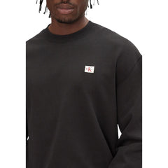 Image 3 : Vue d'ensemble sweat col rond Calvin Klein Jeans noir coupe décontractée homme — Delvale