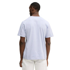 Image 2 : Vue de face du t-shirt Calvin Klein Jeans homme col rond bleu pastel, coupe casual moderne — Delvale