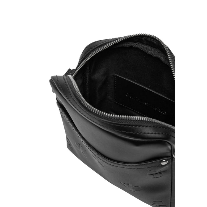 Image 4 : Intérieur organisé sacoche Calvin Klein noir compartiments et poches multiples — Delvale