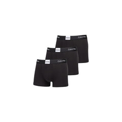 Image 1 : Lot de 3 boxers Calvin Klein Underwear homme noirs, vue de face empilés, ceinture élastique siglée Calvin Klein visible — Delvale