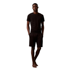 Image 2 : Détail du logo Calvin Klein brodé sur le t-shirt de corps noir, lot de 3 pièces — Delvale