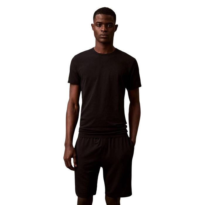 Image 3 : Pack de 3 t-shirts Calvin Klein Underwear homme noirs col rond, présentation étalée — Delvale