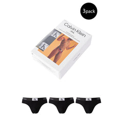 Image 1 : Boîte officielle Calvin Klein 1996 contenant un lot de 3 slips homme en coton stretch, avec visuel masculin sur l'emballage — Delvale