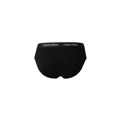 Image 3 : Trois slips Calvin Klein hip brief noirs disposés côte à côte, ceinture élastique siglée CK visible — Delvale