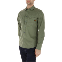 Image 3 : Détail du bas de la chemise G-Star homme kaki militaire, coupe ajustée portée rentrée dans un jean foncé — Delvale