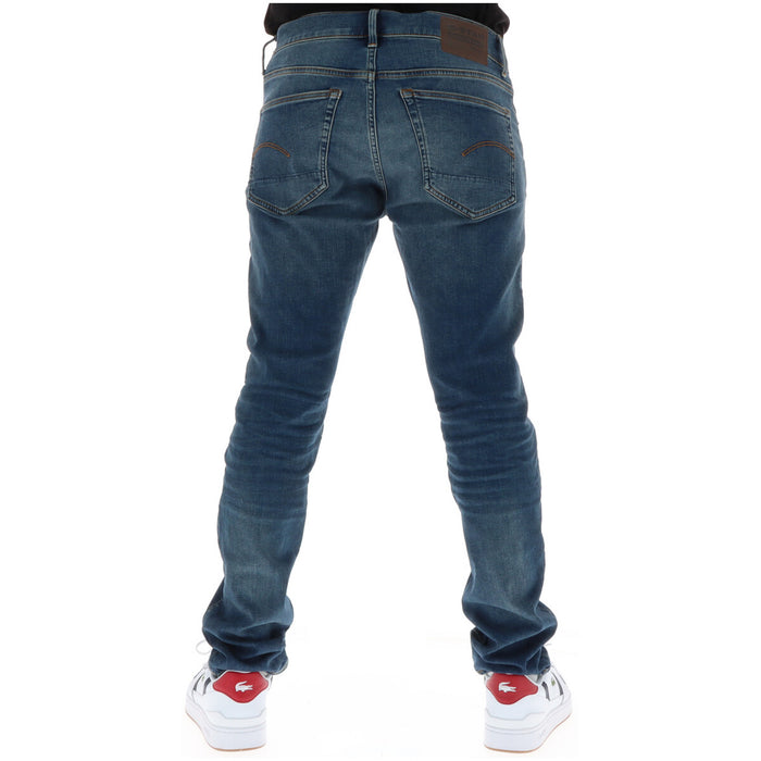Image 2 : Détail de la coupe slim et du denim bleu délavé du jean G-Star homme, mise en valeur de la finition effet vintage — Delvale
