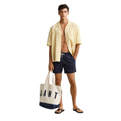 Image 2 : Short de bain Gant homme bleu marine, détail de la ceinture élastiquée et du cordon de serrage — Delvale