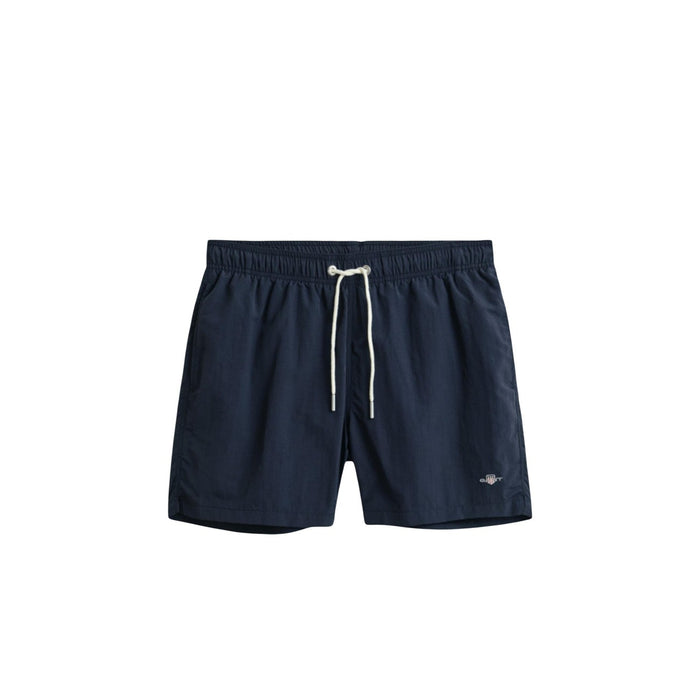 Image 3 : Short de bain Gant homme bleu marine, vue de côté avec poche latérale visible — Delvale