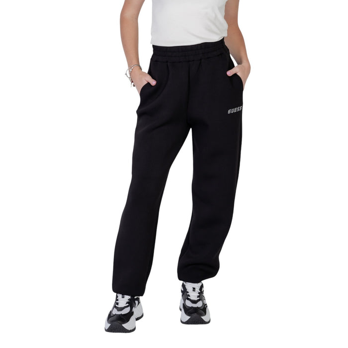 Image 1 : Jogging oversize Guess Active femme noir avec logo argenté sur cuisse gauche — delvale