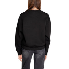 Image 2 : Détail logo GUESS en strass argentés sur sweat femme noir — delvale