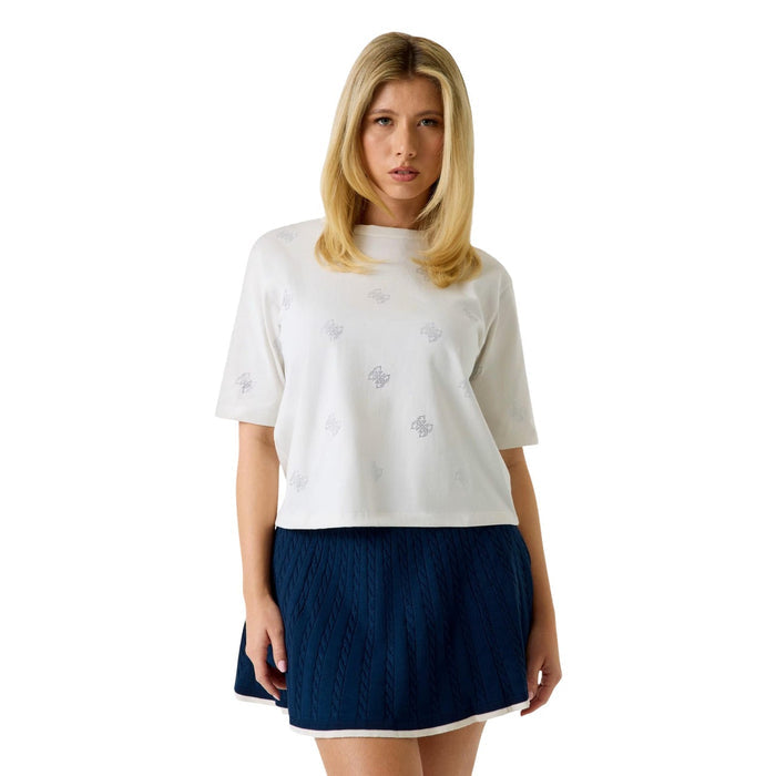 Image 6 : Zoom sur la coupe et les manches courtes du t-shirt Guess femme noir, finitions soignées et détails strass — Delvale