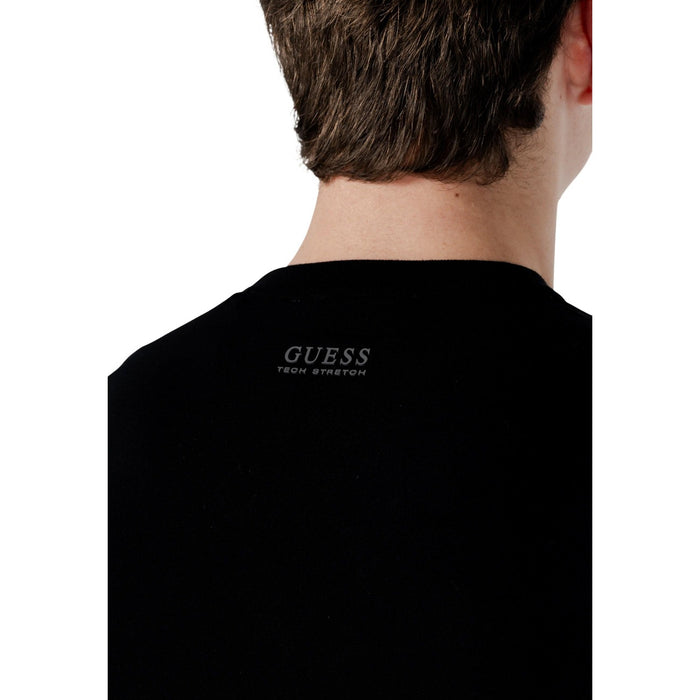 Image 2 : Pull homme Guess maille noire coupe ajustée, détail encolure ras-du-cou et bord-côte — Delvale