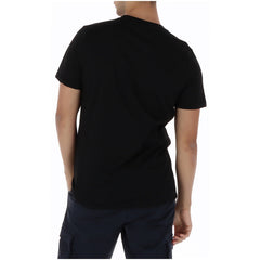 Image 2 : Détail du logo ICON imprimé en grand format sur t-shirt noir manches courtes, encolure ronde — Delvale