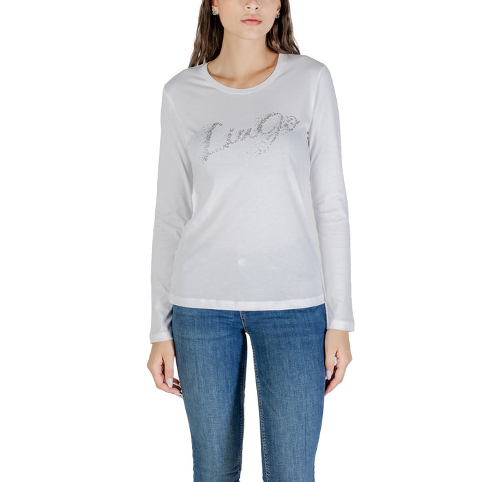 Image 1 : Liu Jo t-shirt femme blanc à manches longues avec logo strass argenté, porté avec un jean brut — Delvale