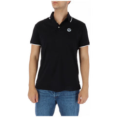 Image 1 : Polo homme North Sails noir piqué coton, vue de face portée, liseré blanc sur col et manches, badge logo poitrine — Delvale