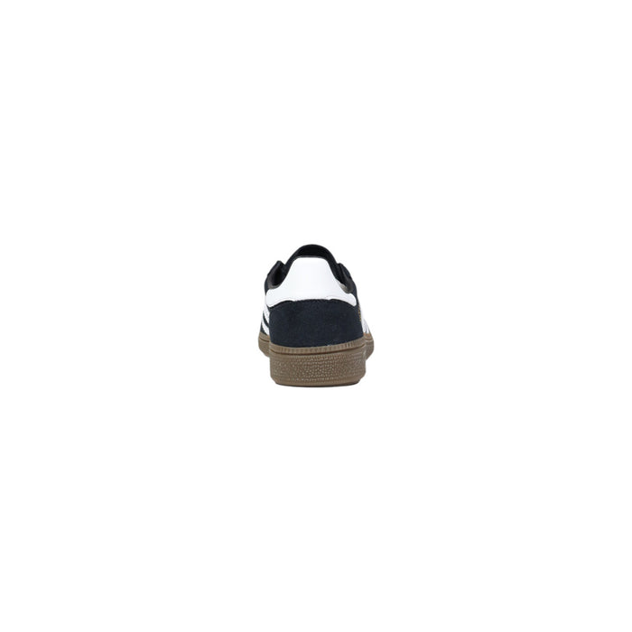 Image 4 : Vue de dessous de la semelle en gomme caramel de la basket Adidas Spezial femme avec logo Adidas moulé — Delvale