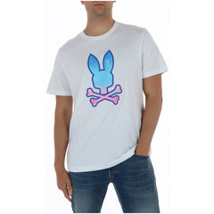 Image 1 : T-shirt blanc Psycho Bunny homme porté par un modèle masculin, avec imprimé Bunny Crossbones dégradé bleu et rose au centre — Delvale