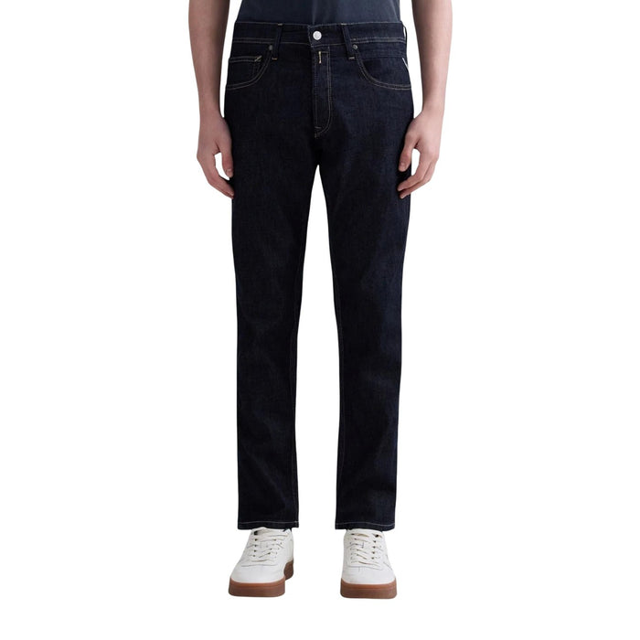 Image 1 : Jean slim Replay homme en denim indigo foncé, vue de face portée, fermeture zip et bouton métal visible — Delvale
