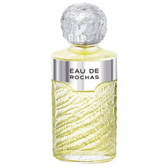 Image 1 : Flacon Rochas Eau de Rochas Eau de Toilette Vaporisateur 100ml, design en verre texturé jaune pâle avec bouchon sphérique givré argenté et bandeau argenté estampillé Eau De Rochas — Delvale