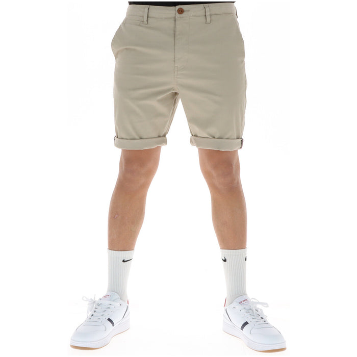 Image 4 : Vue de trois quarts du bermuda chino Superdry homme bleu marine, poches frontales visibles — Delvale