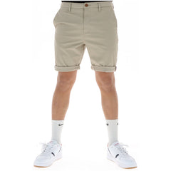 Image 4 : Vue de trois quarts du bermuda chino Superdry homme bleu marine, poches frontales visibles — Delvale