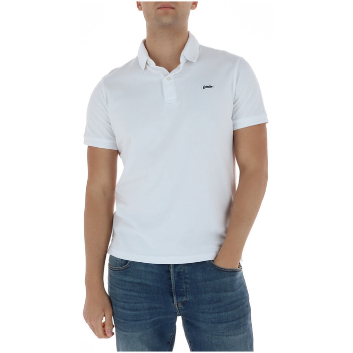 Image 1 : Polo homme Superdry blanc piqué manches courtes, vue de face portée, logo brodé sur la poitrine — Delvale